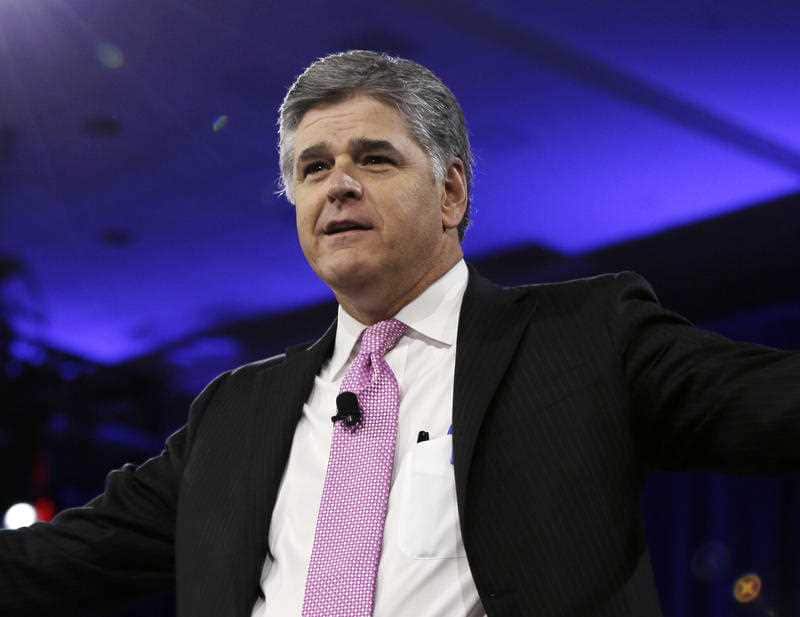 In this March 4, 2016, file photo, Sean Hannity of Fox News arrives in National Harbor, Md.