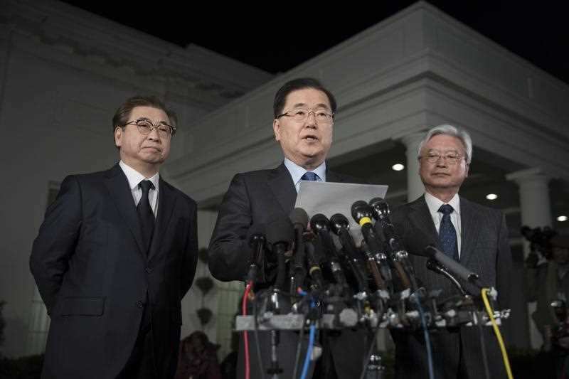 outh Korean National Security Director Chung Eui-yong (C) makes a statement regarding his 07 March meeting with North Korean leader Kim Jong Un.