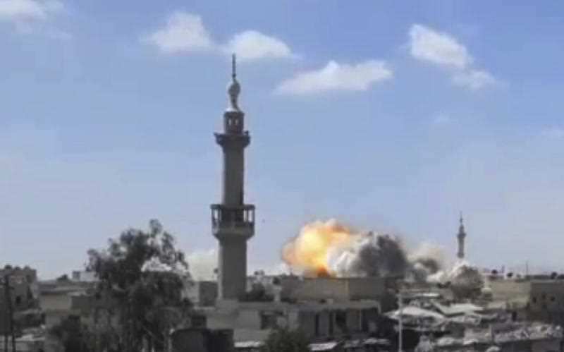  flames rising from a Syrian government forces airstrike attack, in eastern Ghouta, suburb of Damascus, Syria.