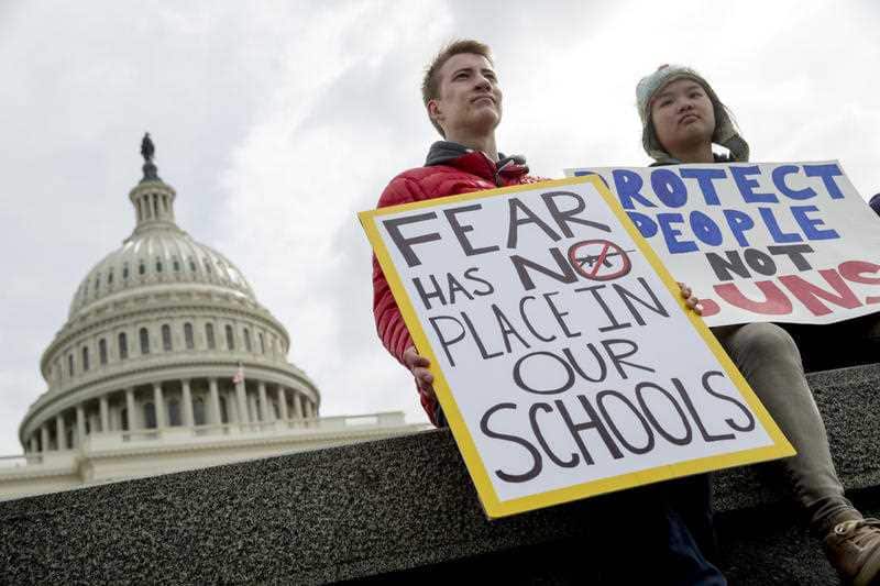 Students rally outside the Capitol Building in Washington, Wednesday, March 14, 2018.