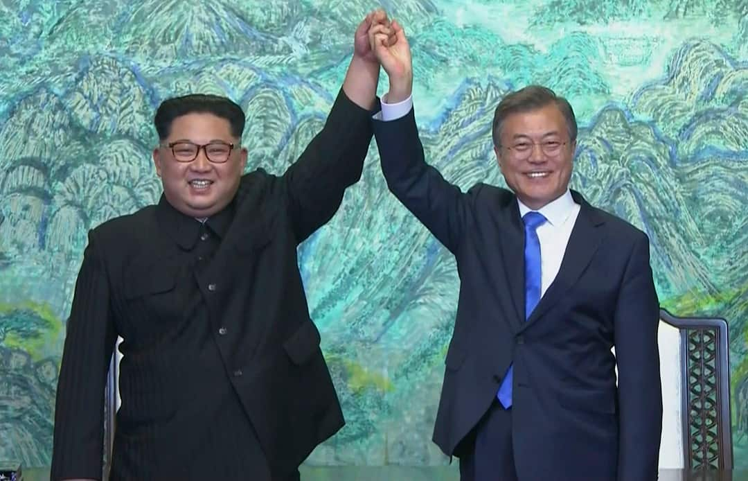 North Korean leader Kim Jong-un, left, and South Korean President Moon Jae-in on Friday.