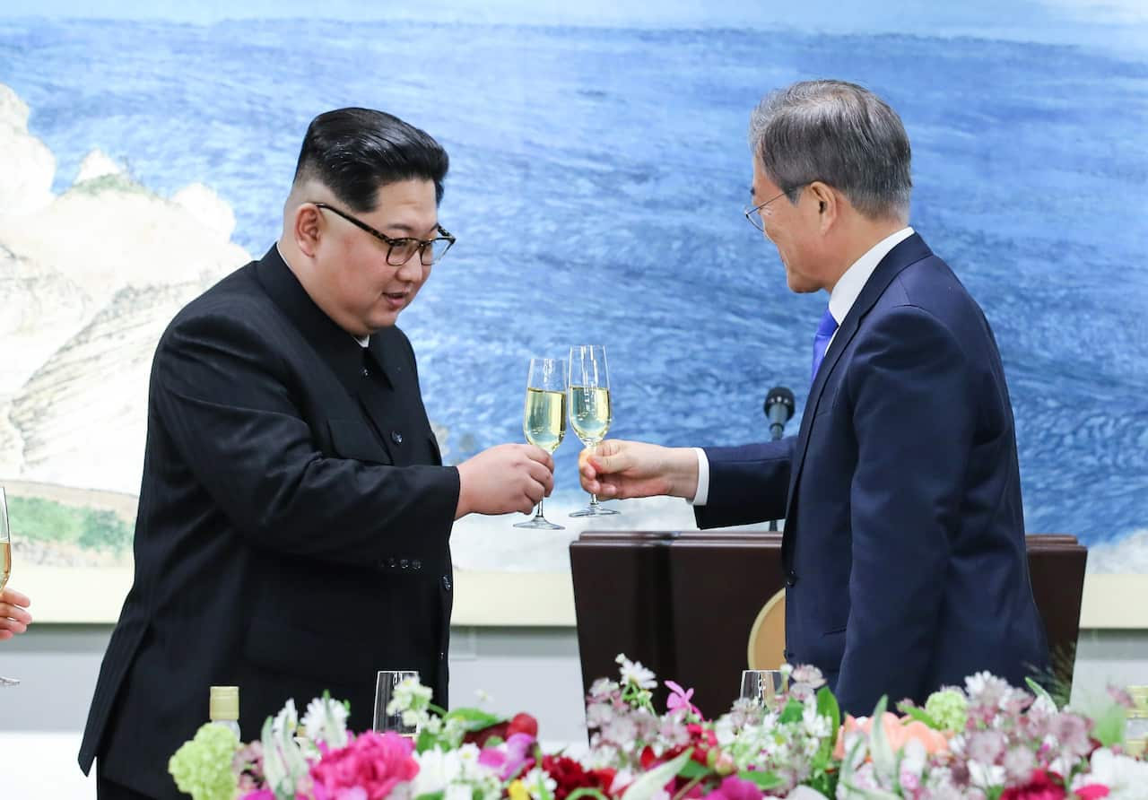 North Korean leader Kim Jong-Un and South Korean President Moon Jae-In toast during a reception dinner at the Peace House on Joint Security Area on the Demilitarized Zone.