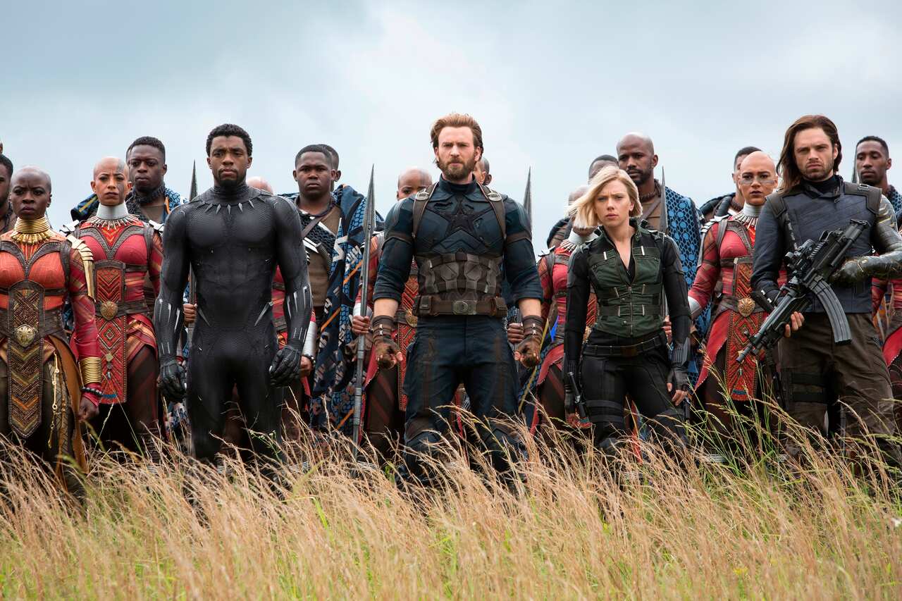This image released by Marvel Studios shows, front row from left, Danai Gurira, Chadwick Boseman, Chris Evans, Scarlet Johansson and Sebastian Stan in a scene from "Avengers: Infinity War." 