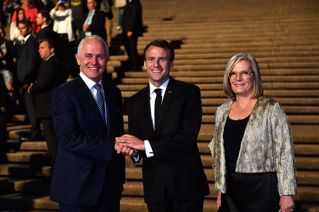 France's President Emmanuel Macron meets with Prime Minister Malcolm Turnbull and his wife Lucy Turnbull at the Sydney Opera House.