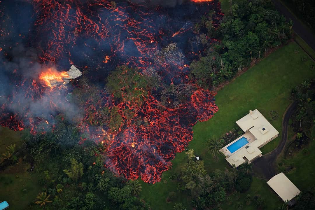 Lava reaches houses in Hawaii.