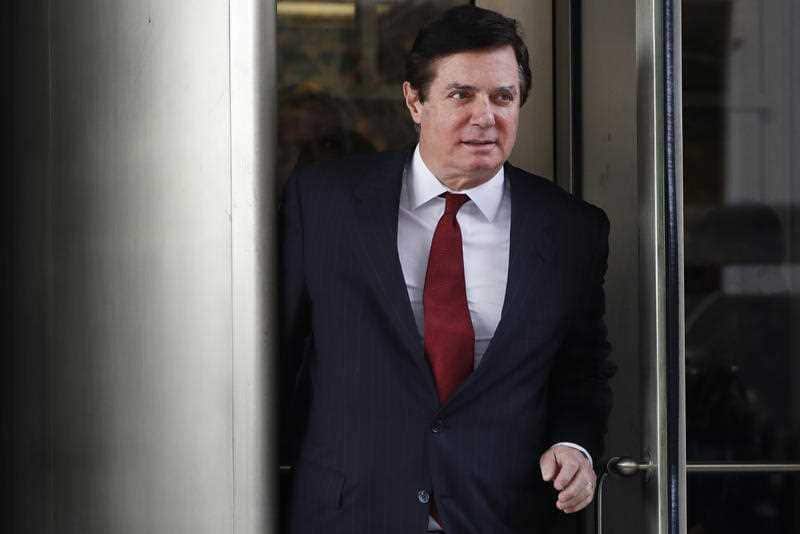 In this Nov. 6, 2017 photo, Paul Manafort, President Donald Trump's former campaign chairman, leaves the federal courthouse in Washington.