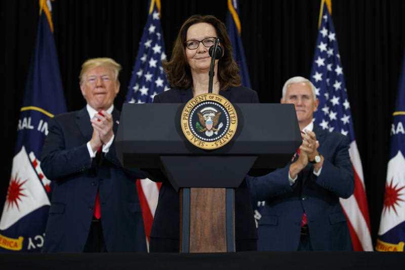 President Donald Trump and Vice President Mike Pence applaud incoming Central Intelligence Agency director Gina Haspel