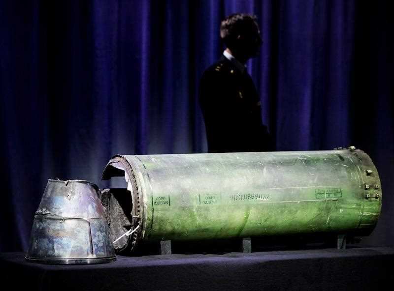 A damaged Buk missile that was reportedly fired on the MH17 is displayed during a press conference of the Joint Investigation Team (JIT) on the ongoing investigation of the Malaysia Airlines MH17 crash in 2014, in Bunnik, The Netherlands, 24 May 2018. 