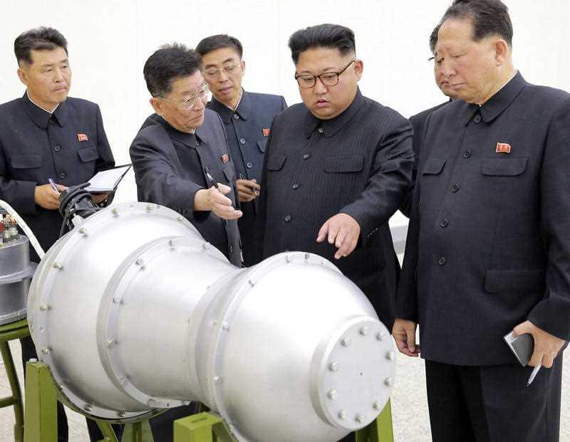 North Korean government, shows North Korean leader Kim Jong Un, second from right, at an undisclosed location.