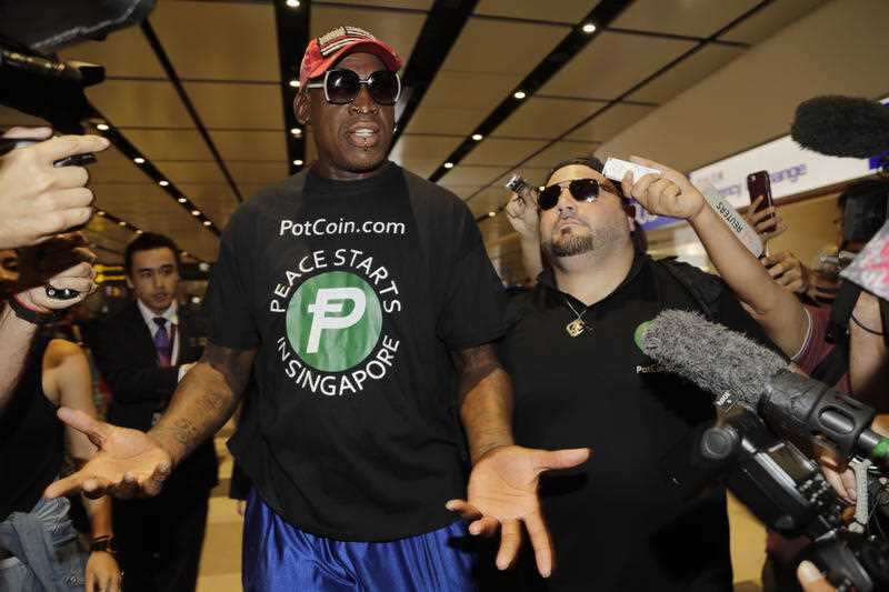 Dennis Rodman arriving in Singapore