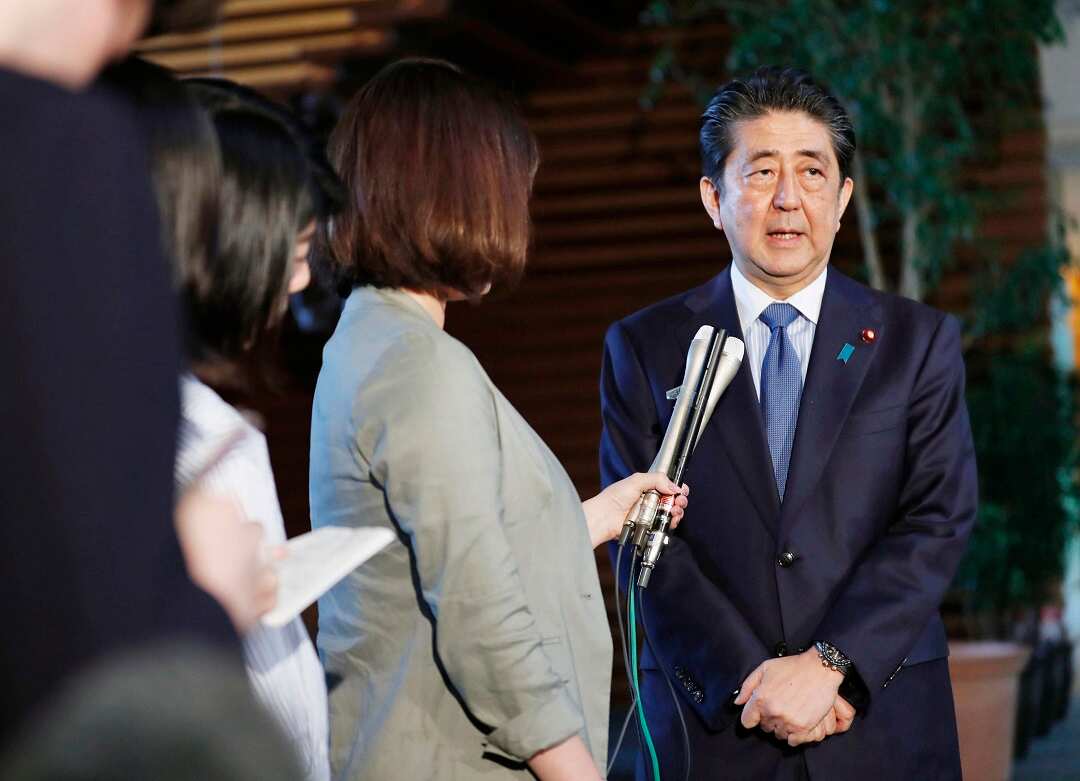 Japanese Prime Minister Shinzo Abe speaks to reporters on June 12.