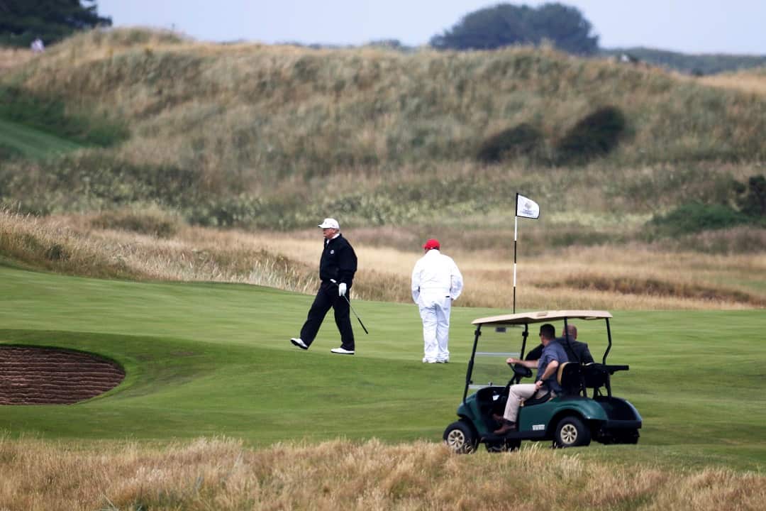 Donald Trump plays at Turnberry golf club, Scotland.