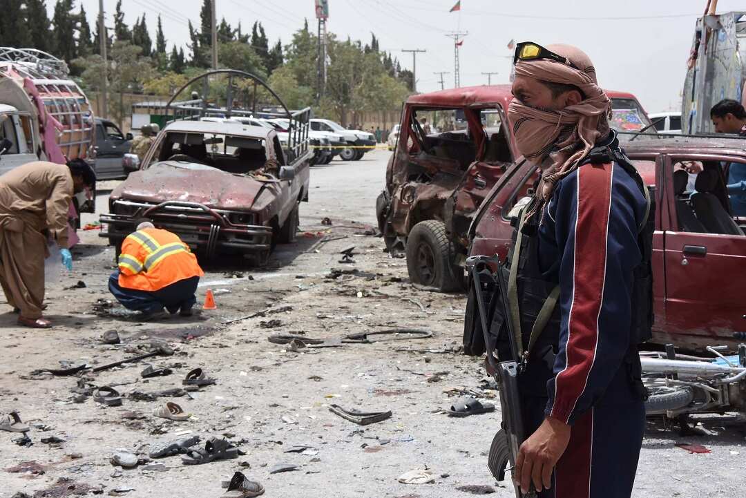 The scene following a Islamic State-claimed suicide attack at a polling station in Quetta, Pakistan. The election has been marred by violence.