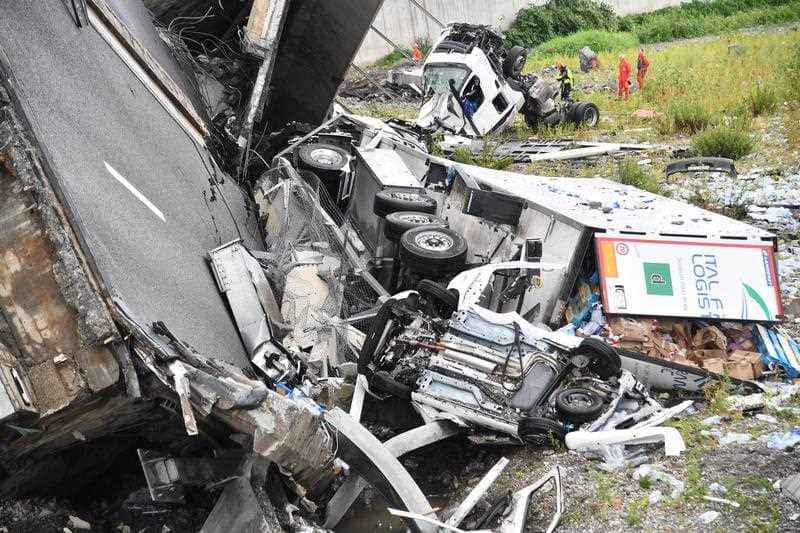 Vehicles lay strewn on the ground.