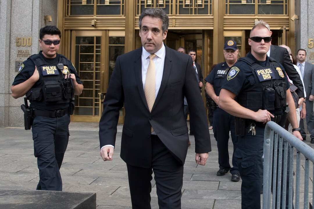 Michael Cohen leaves court on Tuesday.