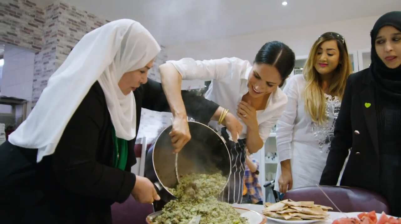 The Duchess of Sussex cooking with women in the Hubb Community Kitchen at the Al Manaar Muslim Cultural Heritage Centre in West London.