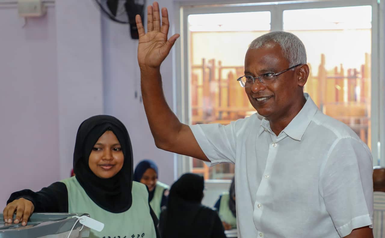 Maldives' opposition presidential candidate Ibrahim Mohamed Solih casting his vote during presidential election day in Male, Maldives, Sunday, Sept. 23, 2018. (AP Photo/Mohamed Sharuhaan)