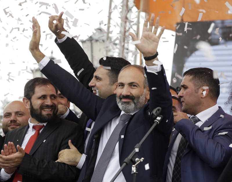 Armenian Prime Minister Nikol Pashinian gestures as he addresses the crowd in Republic Square in Yerevan, Armenia.