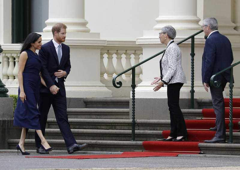 Britain's Prince Harry and Meghan, Duchess of Sussex are welcomed to Government House by the Governor of Victoria.