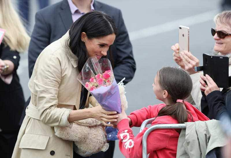 Meghan, the Duchess of Sussex is seen during the meet the people walk in Melbourne.