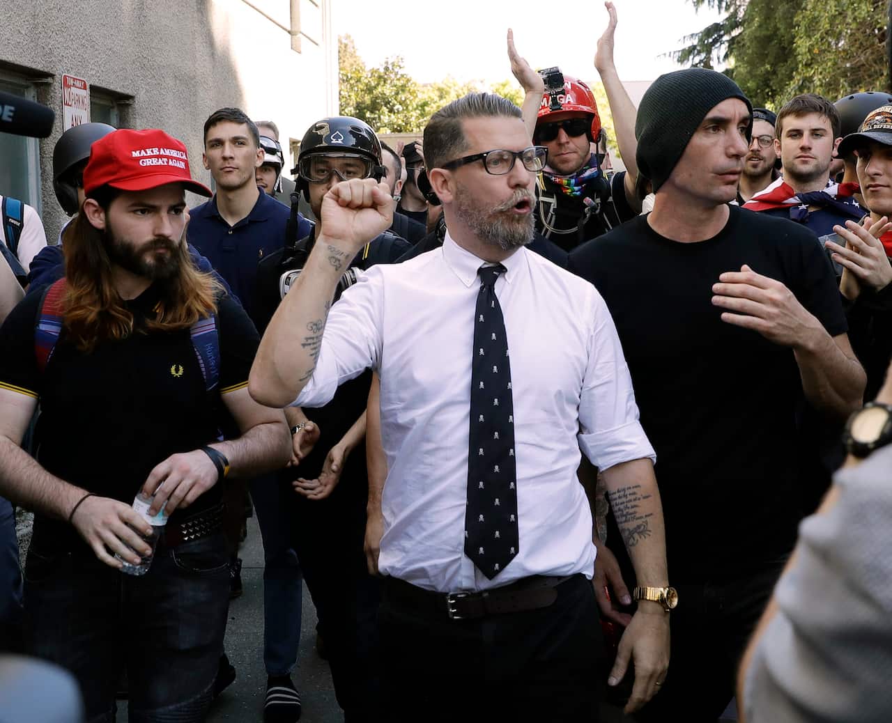 Gavin McInnes, center, founder of the far-right group Proud Boys.