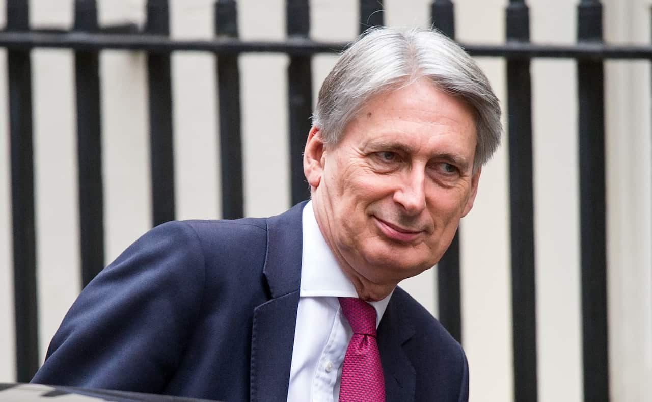 British Chancellor of the Exchequer Philip Hammond leaves 11 Downing Street, Central London, Britain, 15 November 2018.