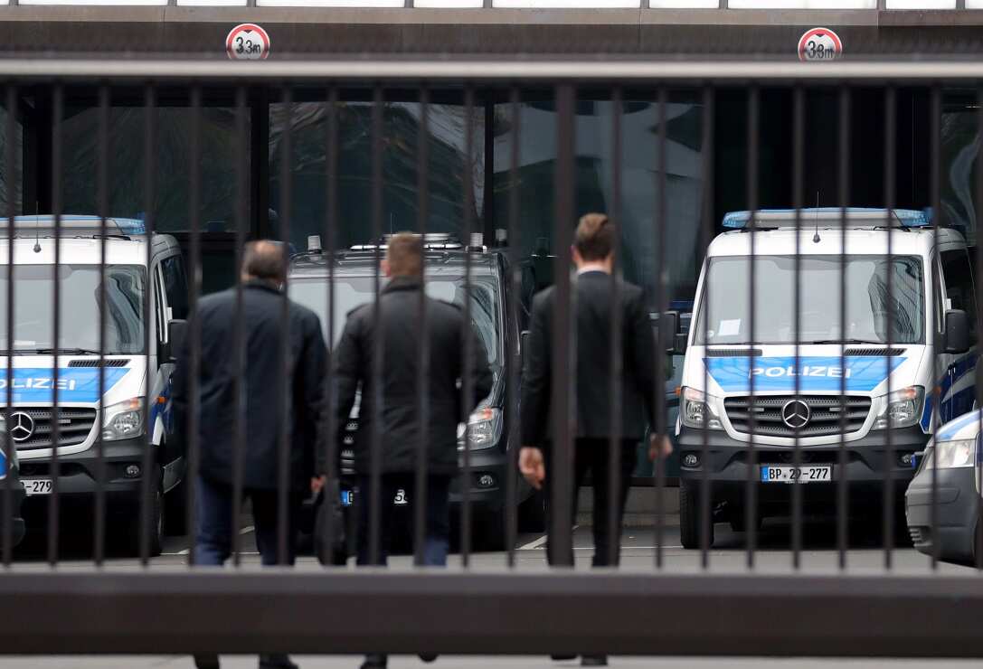 Investigators at Deutsche Bank headquarters in Frankfurt.