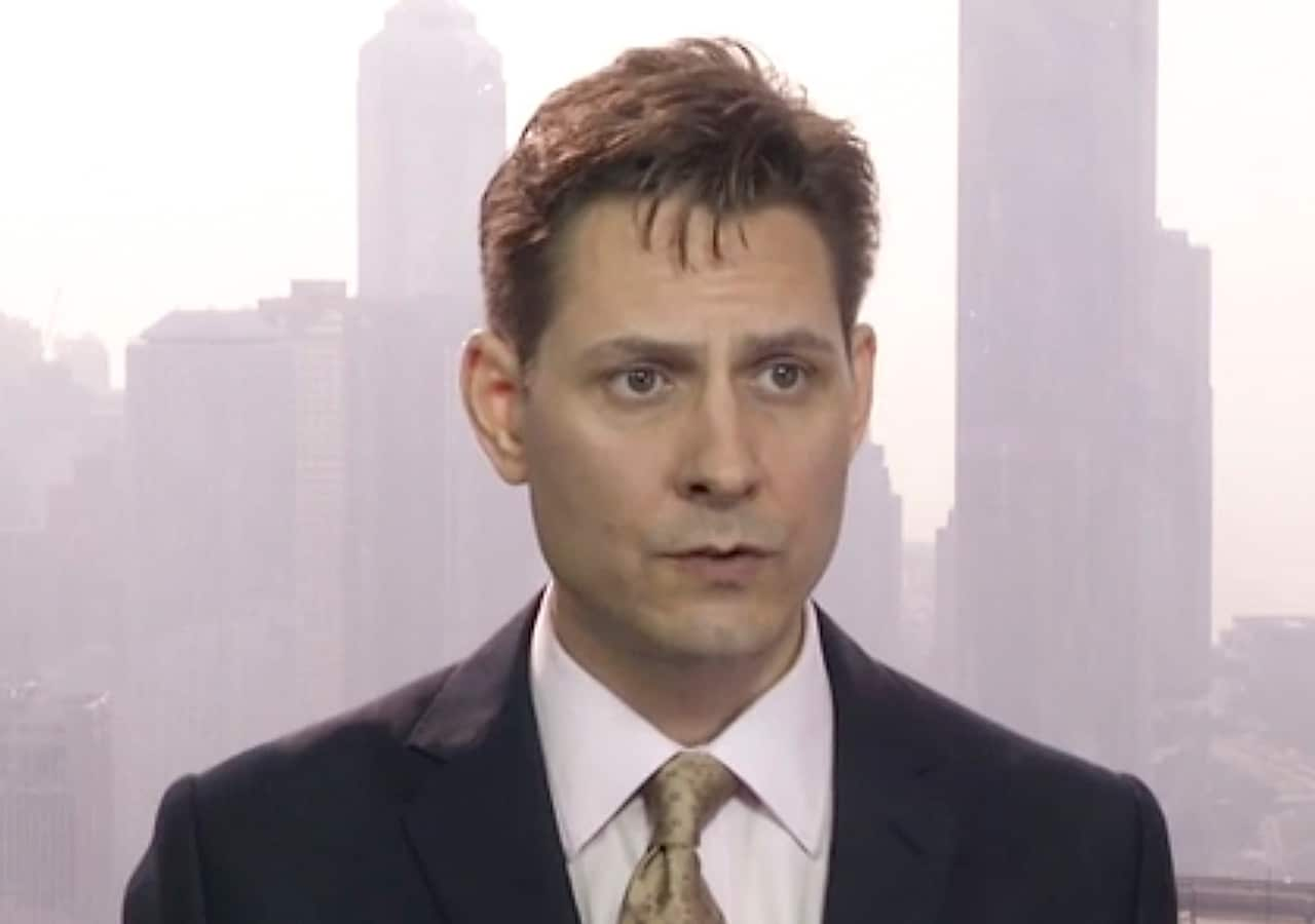 Michael Kovrig being interviewed in Hong Kong.