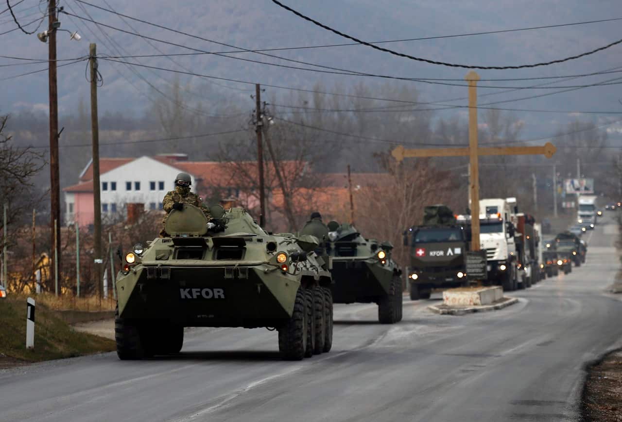A convoy of NATO-led peacekeeping force KFOR vehicles in Kosovo.