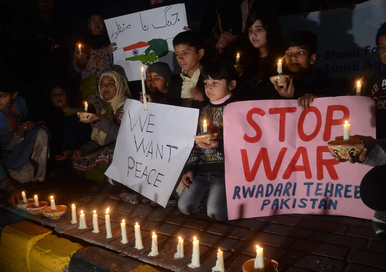 A candlelit vigil against war at Liberty round about in Lahore, Pakistan.