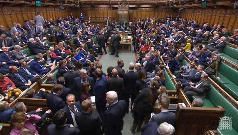 Politicians voting on Brexit deal.