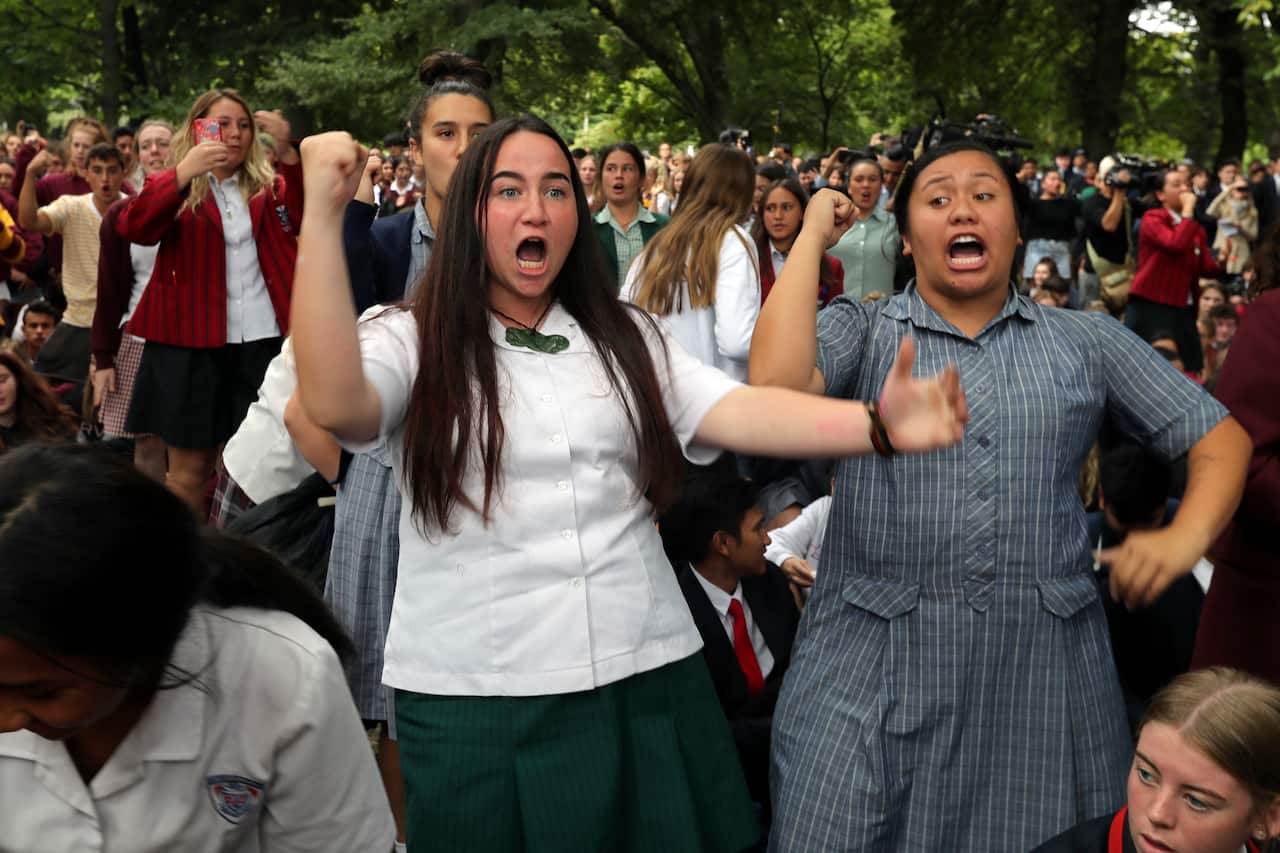 Students perform the Haka during a vigil to commemorate victims of Friday's shooting, outside Masjid Al Noor mosque in Christchurch, New Zealand.