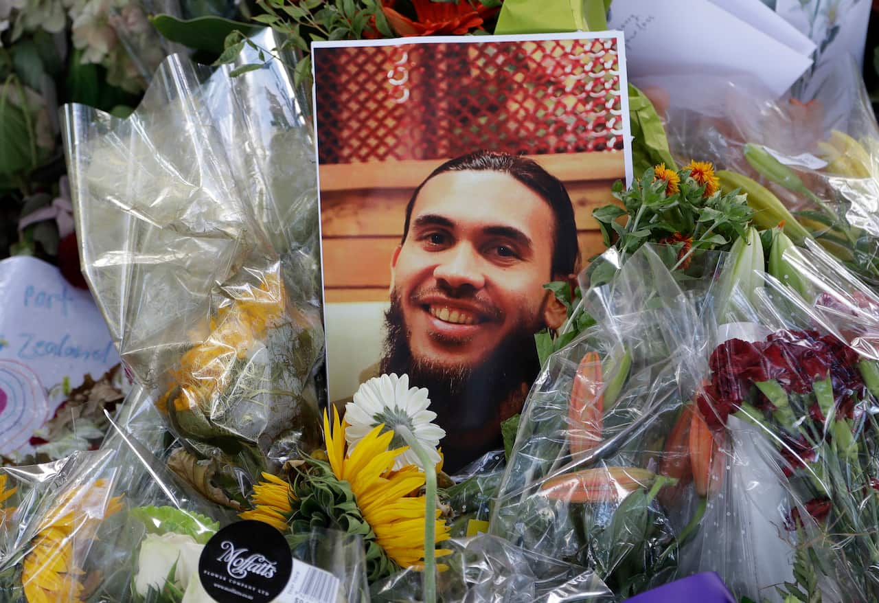 A photo tribute for Christchurch mosque shooting victim Tariq Omar across the road from the Al Noor mosque in Christchurch, New Zealand.