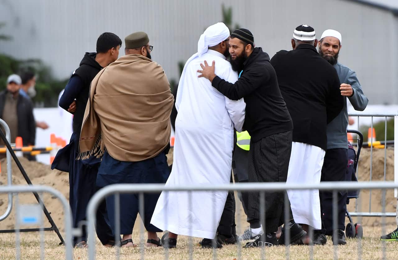 Mourners at the funeral of Sayyad Ahmed Milne, aged 14, at the Memorial Park Cemetery in Christchurch, New Zealand.