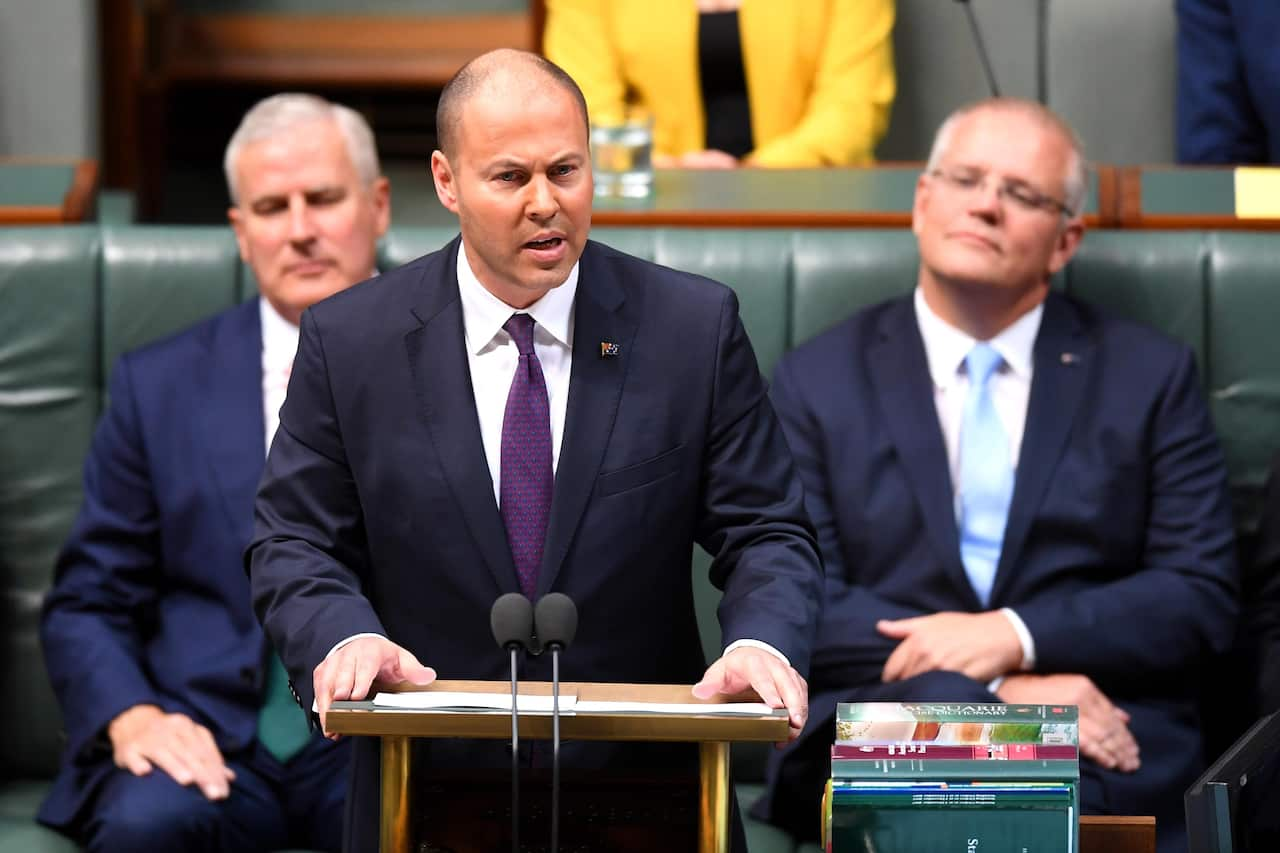 Treasurer Josh Frydenberg handing down his first Federal Budget in the House of Representatives at Parliament House in Canberra, Tuesday, 2 April 2019. (AAP Image/Lukas Coch) NO ARCHIVING