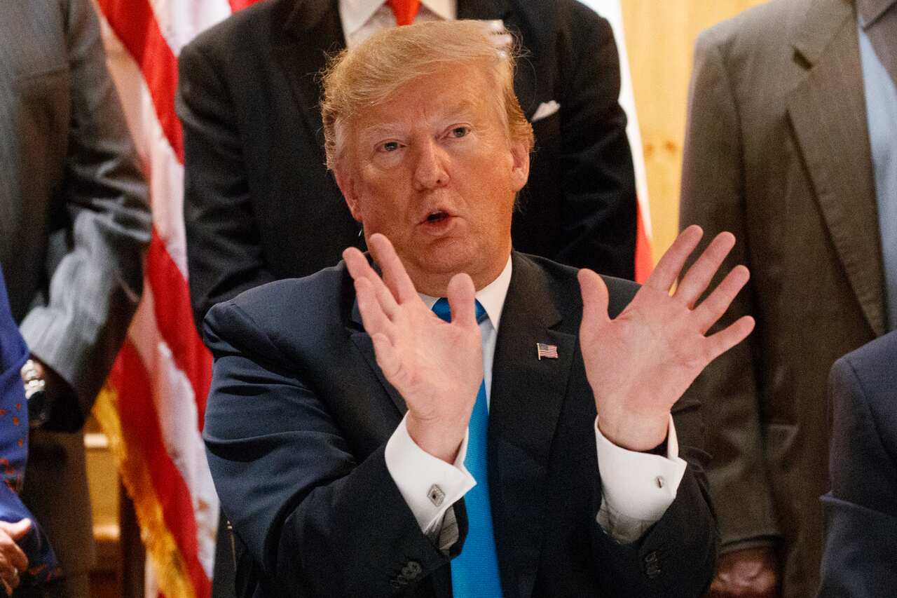 President Donald Trump speaks with reporters about border policy during a fundraising event, Wednesday.