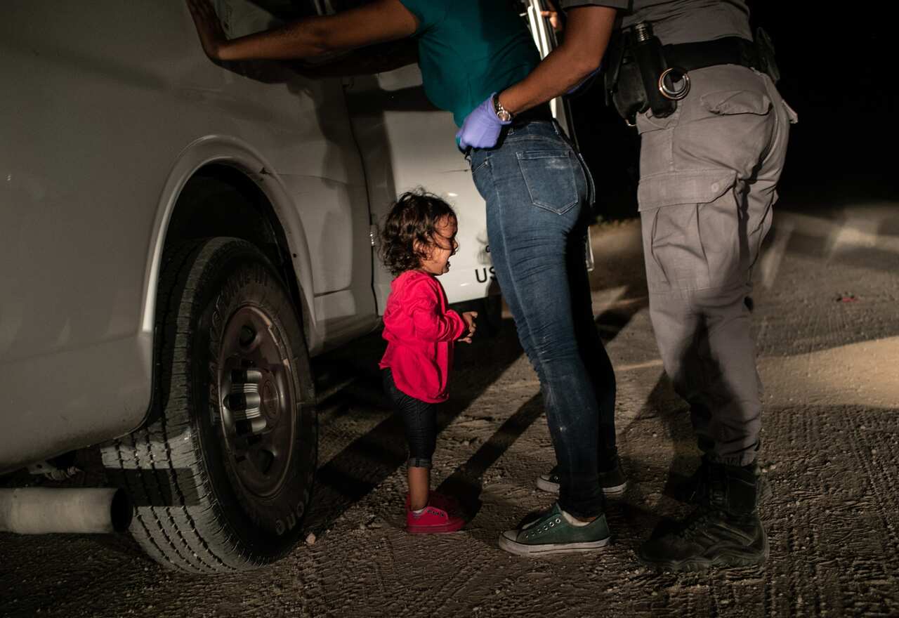 The World Press Photo's 2019 Picture of the Year shows a two-year-old asylum seeker crying as her mother is searched and detained near the US-Mexico border.