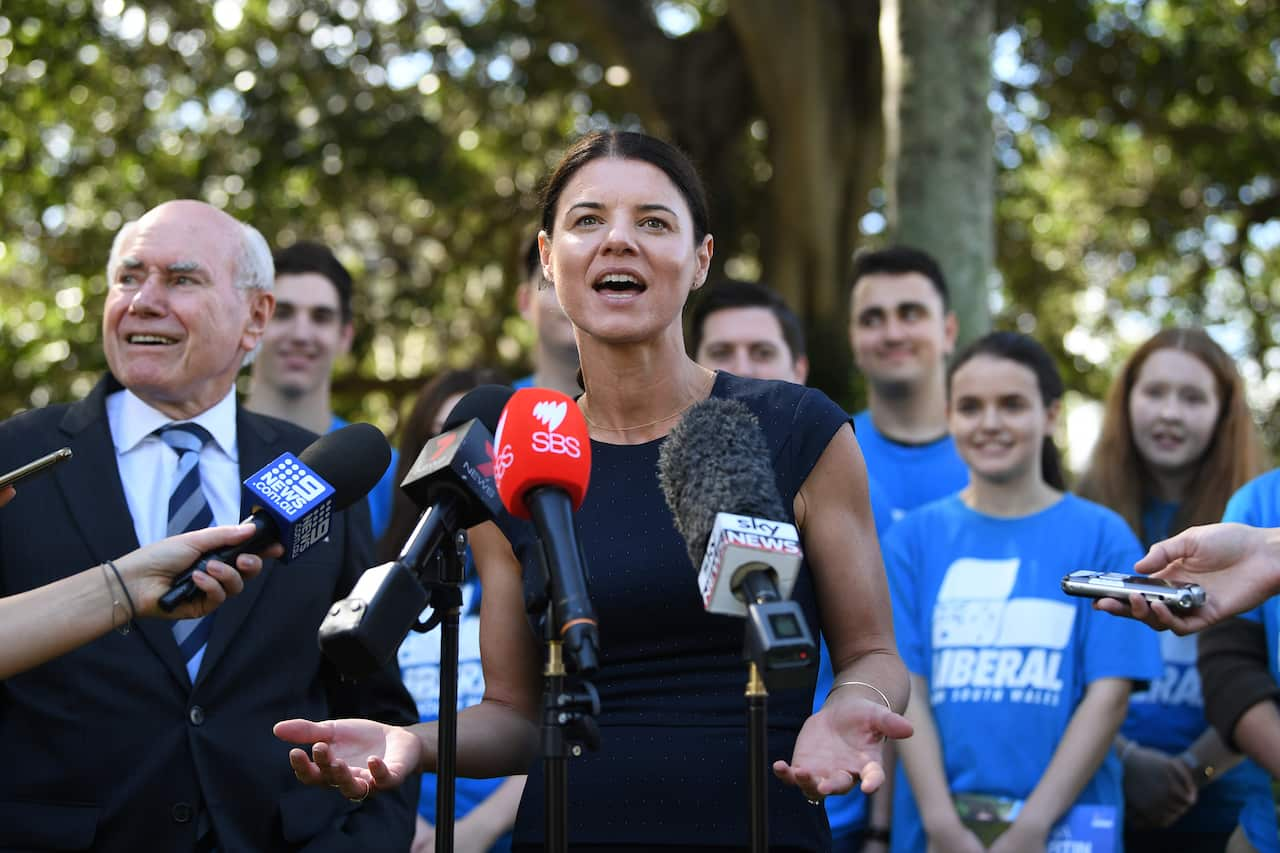 Former prime minister John Howard is joined by Liberal candidate for Reid Fiona Martin as he speaks to the media following a street walk at Burwood in Sydney, Tuesday, April 23, 2019. (AAP Image/Joel Carrett) NO ARCHIVING