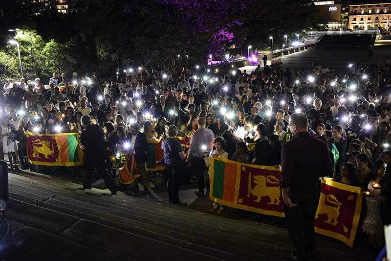 Members of the public join in an interfaith candlelight vigil for the victims of the Easter Sunday bombings in Sri Lanka.