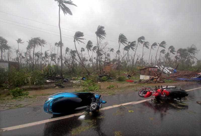 Damgaed motorcyles on the highway.