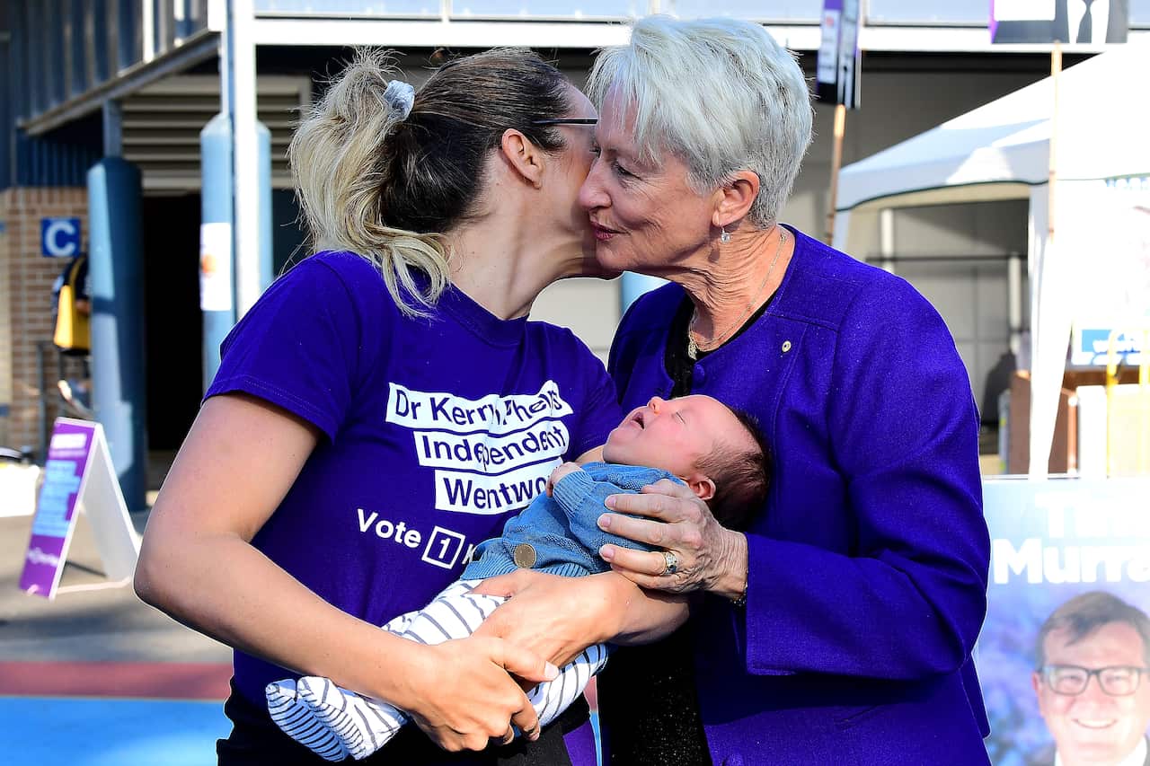 Independent candidate for Wentworth Dr Kerryn Phelps with her daughter and grandchild on election day.