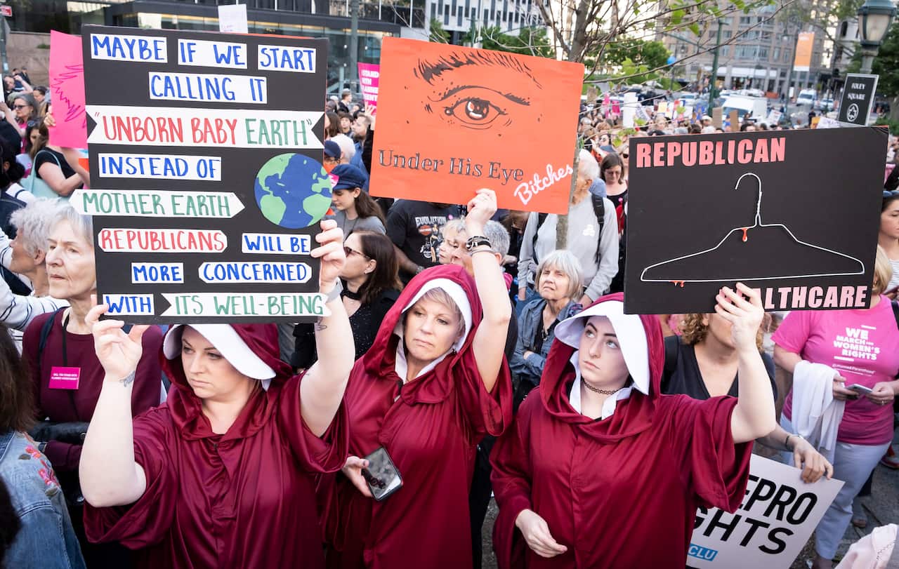 People participate in a pro-abortion rights in New York, in response to extreme anti-abortion laws that were recently passed.