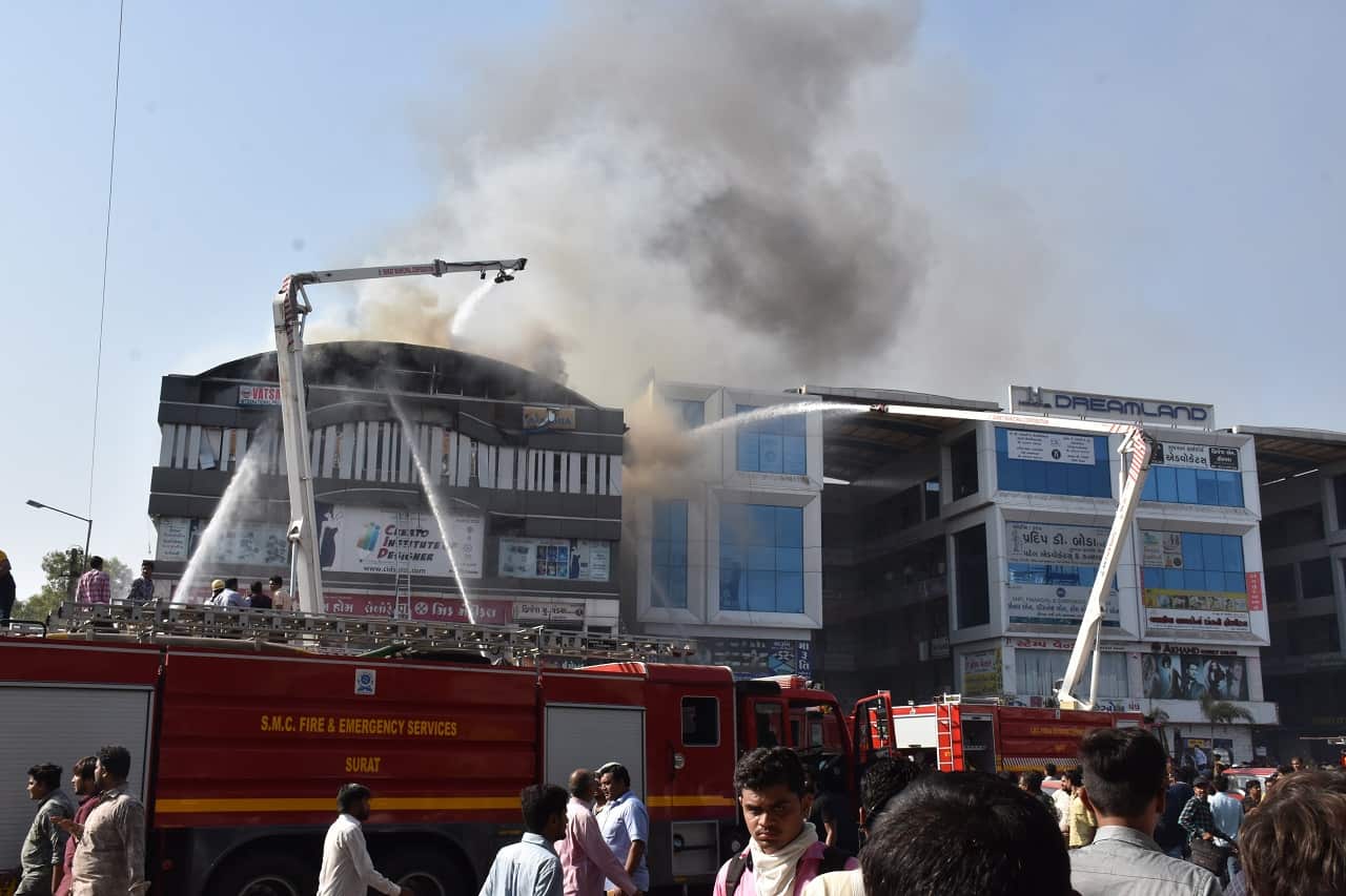 Indian firefighters at the site.