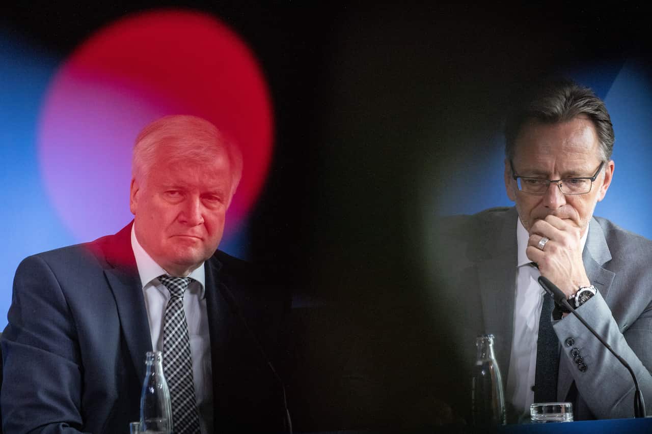German Federal Interior Minister Horst Seehofer (L) and The President of Federal Criminal Police Office Holger Muench.