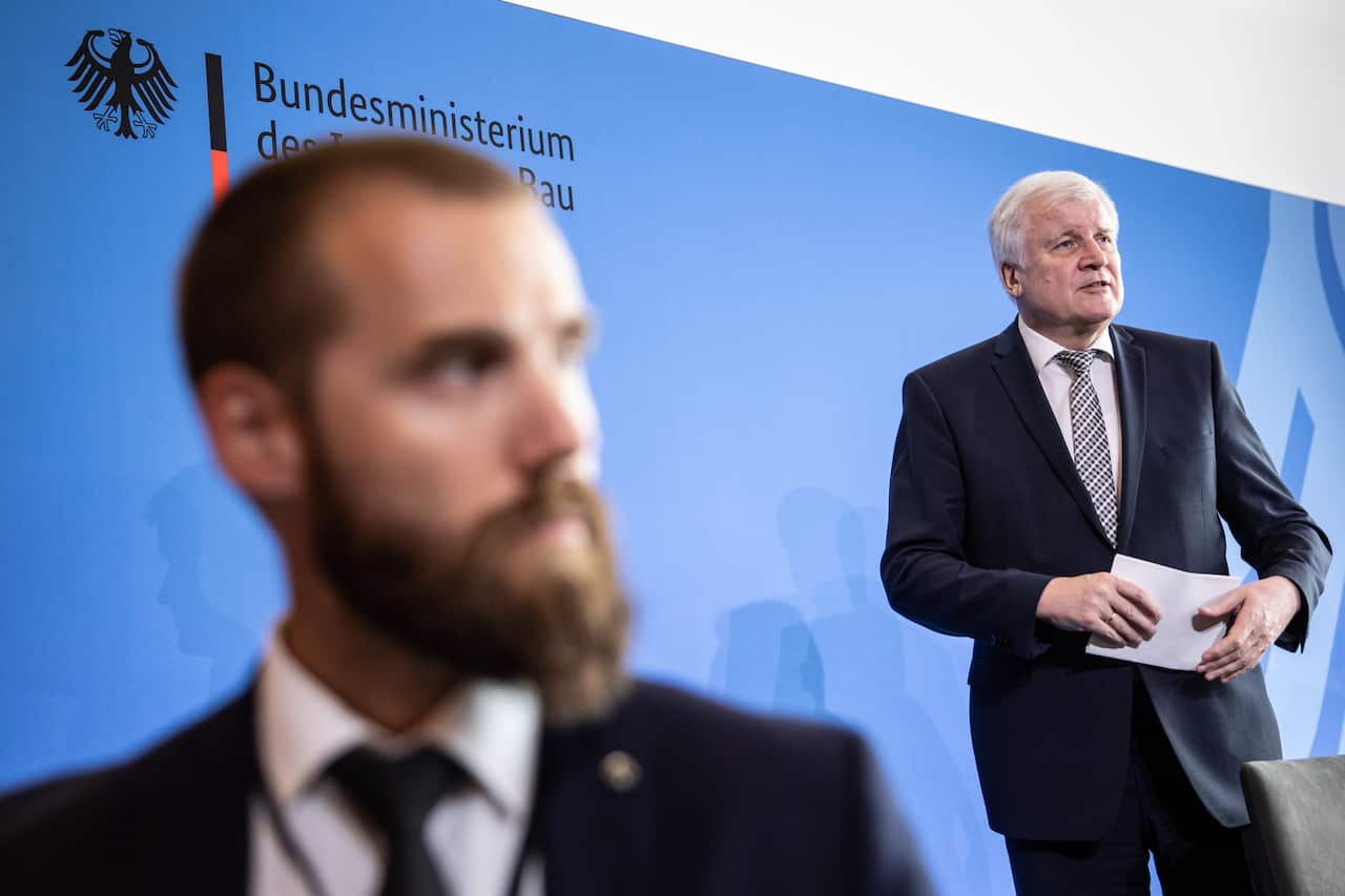 German Federal Interior Minister Horst Seehofer (R), after a press conference regarding the Kassel Government President Walter Luebcke murder case in Berlin.