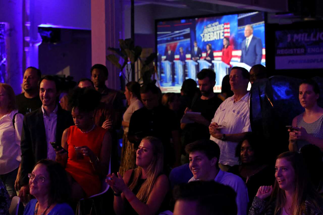 People react at a watch party for the first Democratic presidential primary debates for the 2020 elections in Miami, FL, USA, on Wednesday, June 26, 2019. Photo by John McCall/Sun Sentinel/TNS/ABACAPRESS.COM.