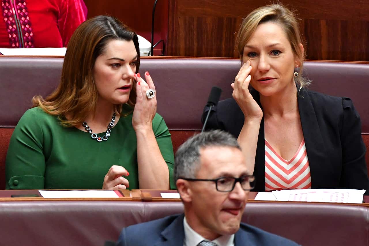 Senator Sarah Hanson-Young, Senator Larissa Waters and Senator Richard Di Natale are seen during  the swearing in to mark the start of the 46th Parliament at Parliament House in Canberra, Tuesday, 2 July 2019. (AAP Image/Sam Mooy) NO ARCHIVING