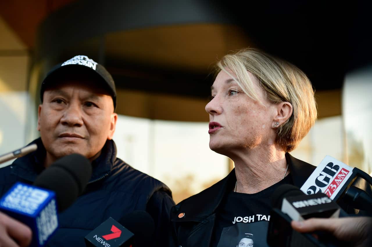 John and Julie Tam, parents of Joshua Tam who died at Lost Paradise music festival in 2018, speak to the media outside of The Coroner's Court of NSW.