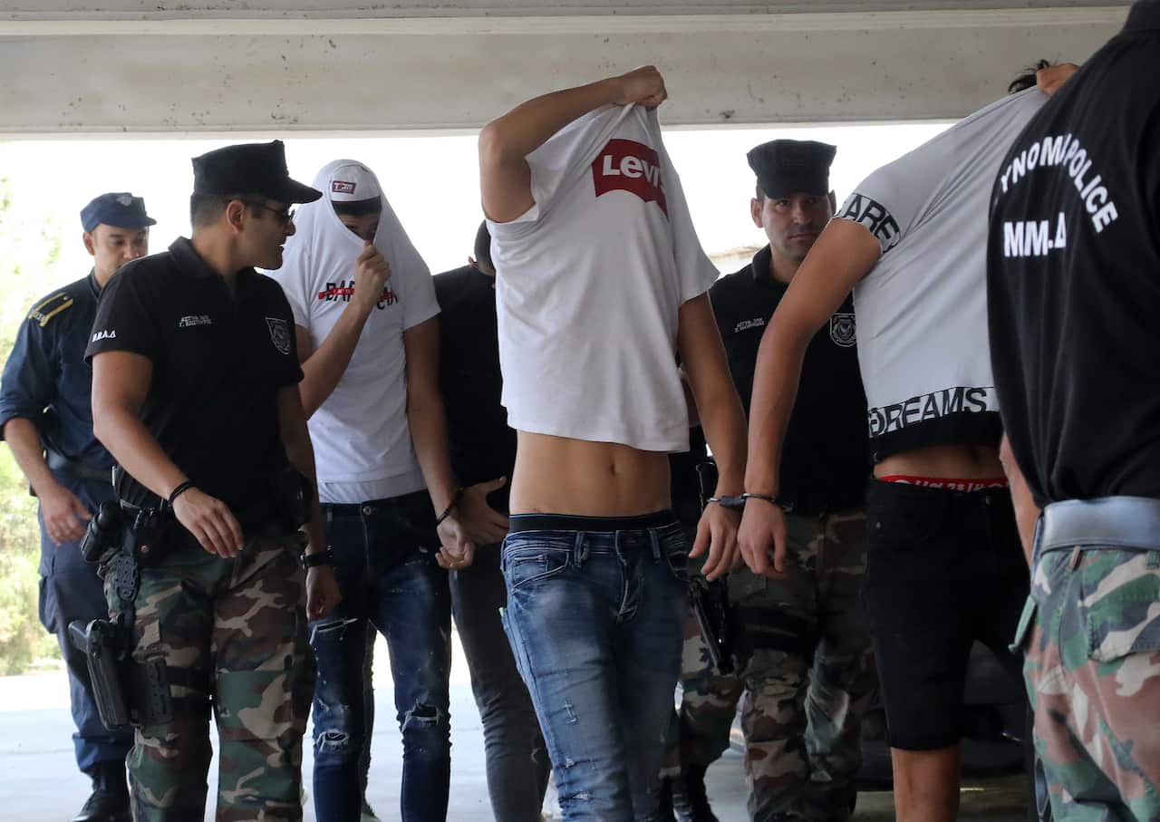 Seven Israeli tourists appear before Famagusta District Court earlier this year.