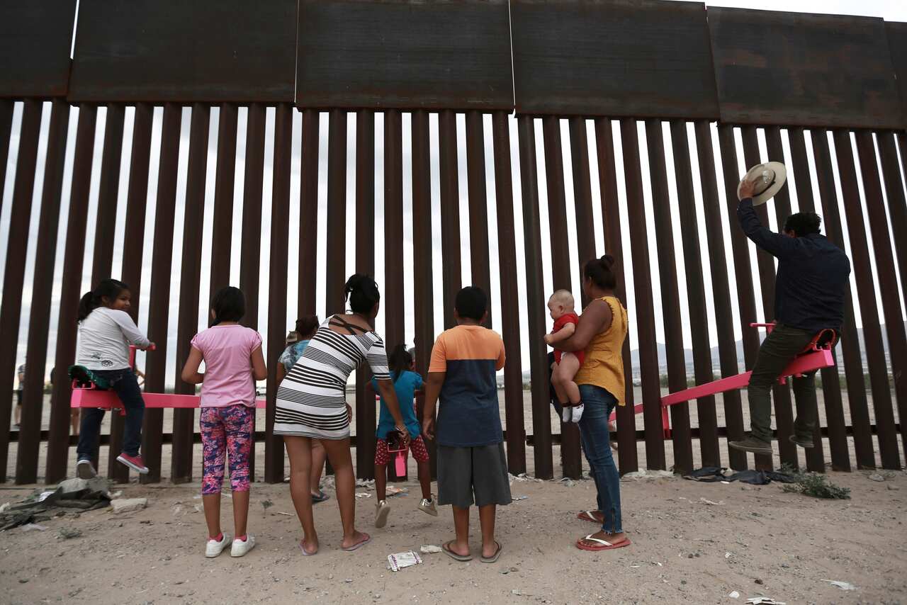 Seesaws in use at the border.